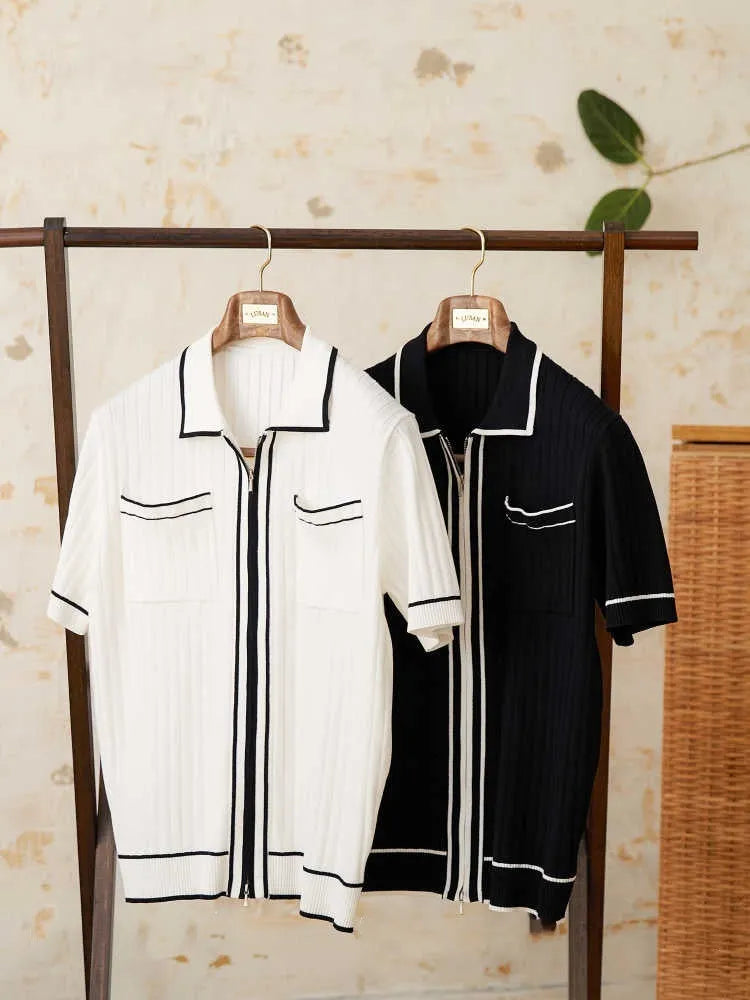 Man's slim-fit black knitted polo shirt with a lapel collar and short sleeves.