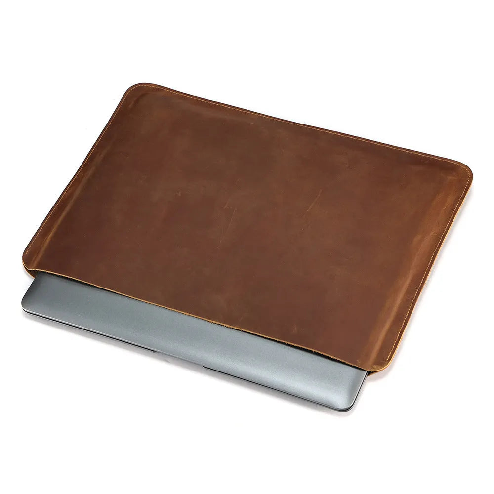 Genuine crazy horse leather horizontal computer liner bag showing medium brown colour and organisational compartments