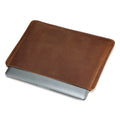 Genuine crazy horse leather horizontal computer liner bag showing medium brown colour and organisational compartments