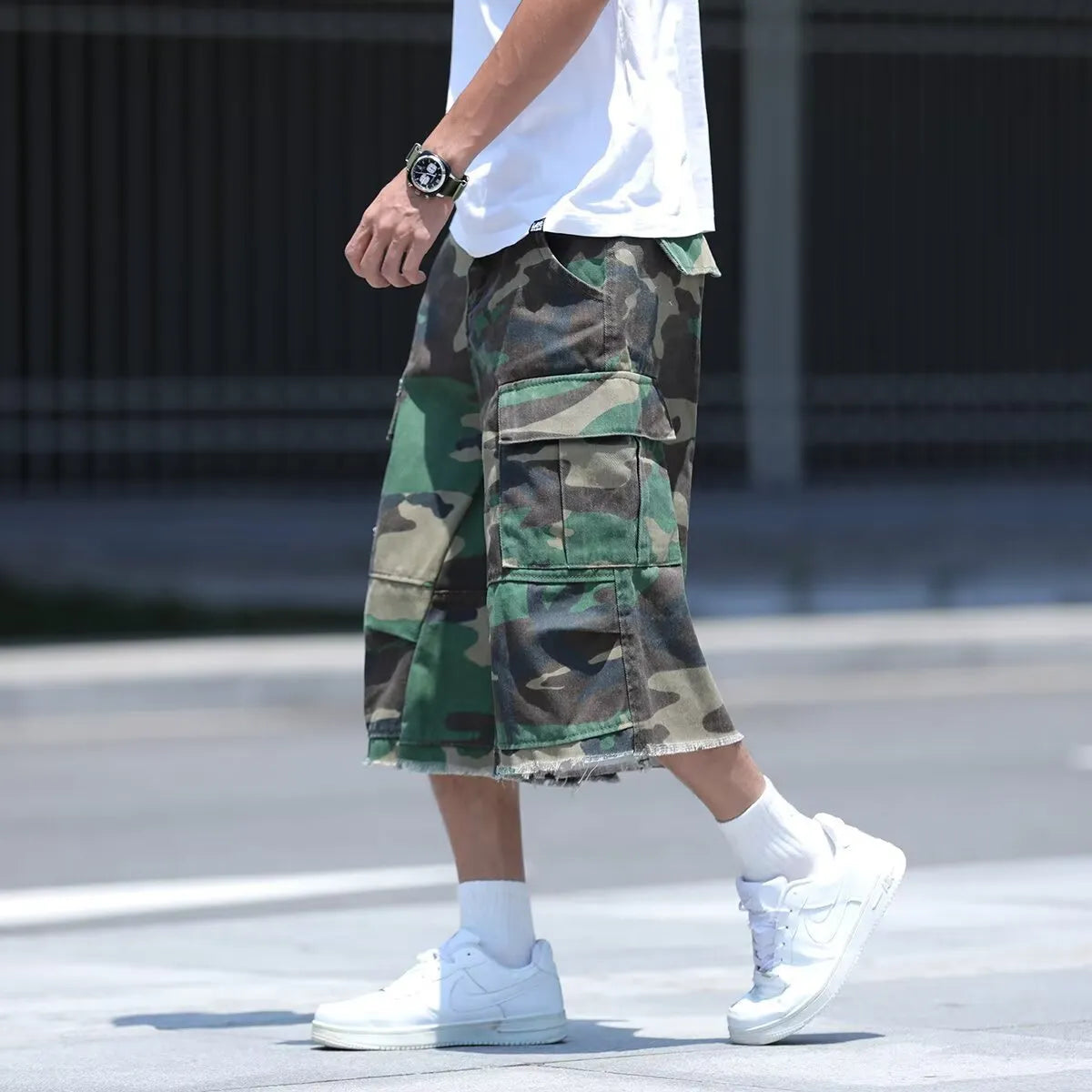 American retro workwear style cotton camouflage shorts in loose fit with cropped length