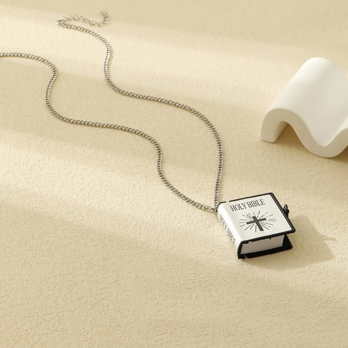 Stylish stainless steel cross necklace with Bible verses pendant, available in gold, silver white, and silver black.