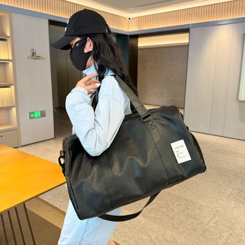 Large and small size dry wet separation PU fitness shoulder messenger bag on a white background.