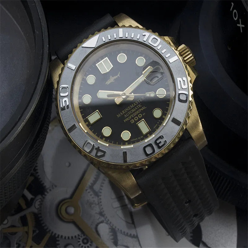 Men's vintage bronze automatic diving watch with gold dial and genuine leather strap on a wooden surface