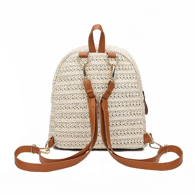 Handwoven straw backpack in beige white, 20x15x21cm, open-top design, lightweight natural fibre for casual beach travel use