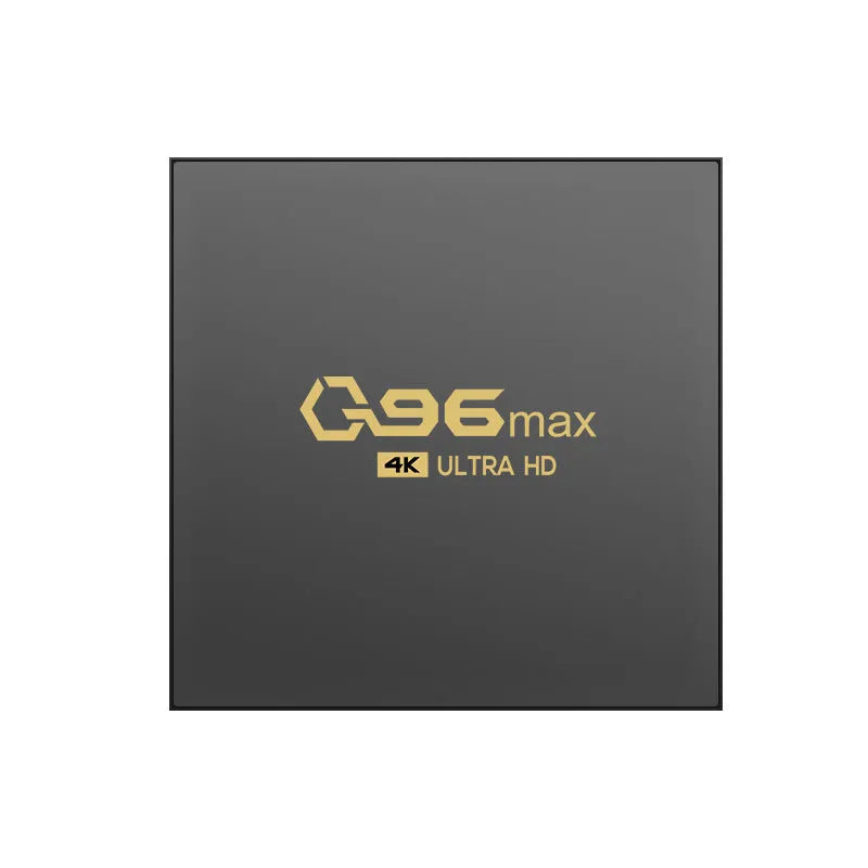 Q96 MAX S905 Android 4K TV Box streaming media player with remote control and accessories on a wooden table.