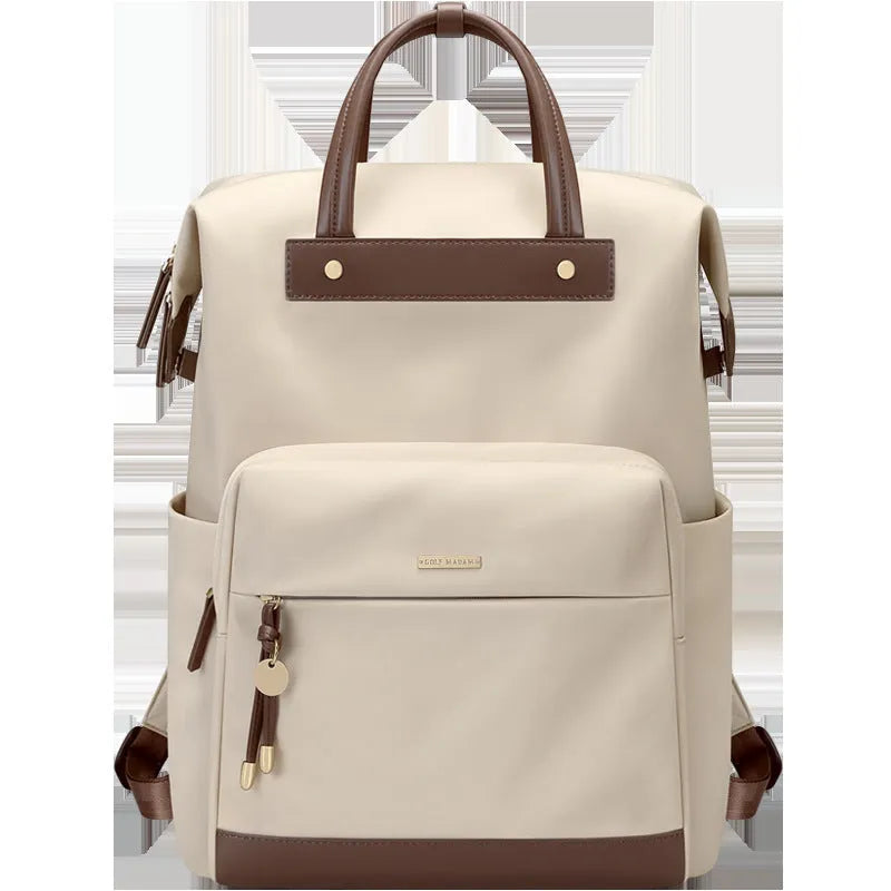 Large fabric backpack for women with synthetic leather trim, shown in apricot colour with adjustable straps.