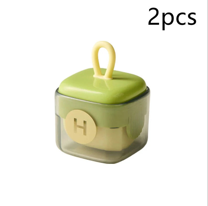 Green and yellow portable lint remover ball with ABS TPE material for gentle fabric care