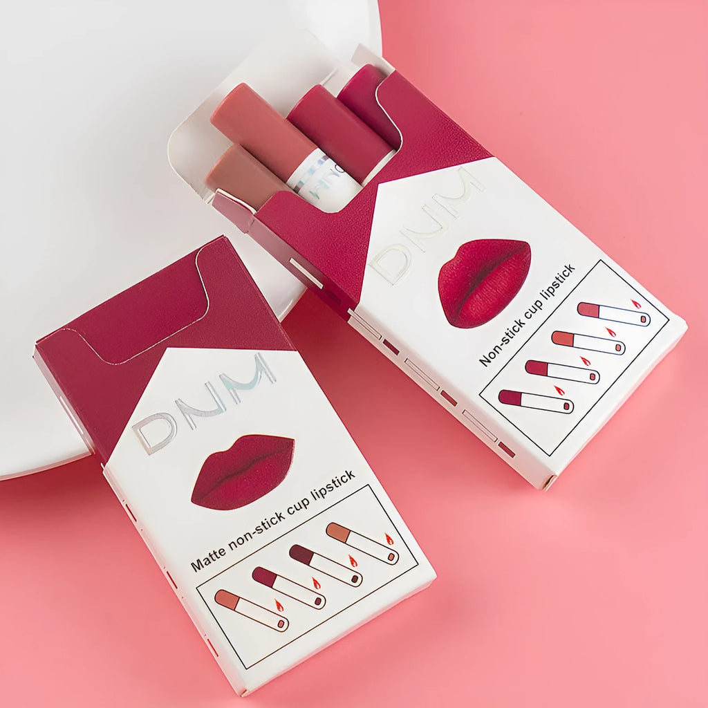 Four makeup set non-stick cigarette pipe thin lipsticks in assorted colours on white background