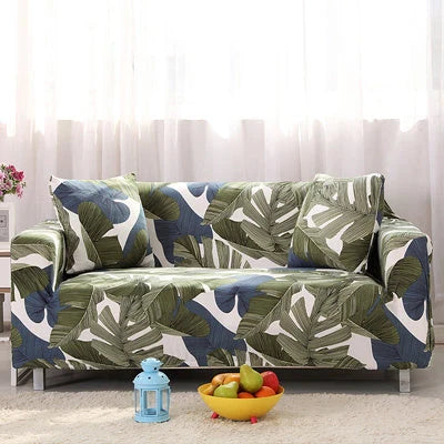 Printed stretchable sofa slipcover covering a three-seater sofa in a modern geometric pattern