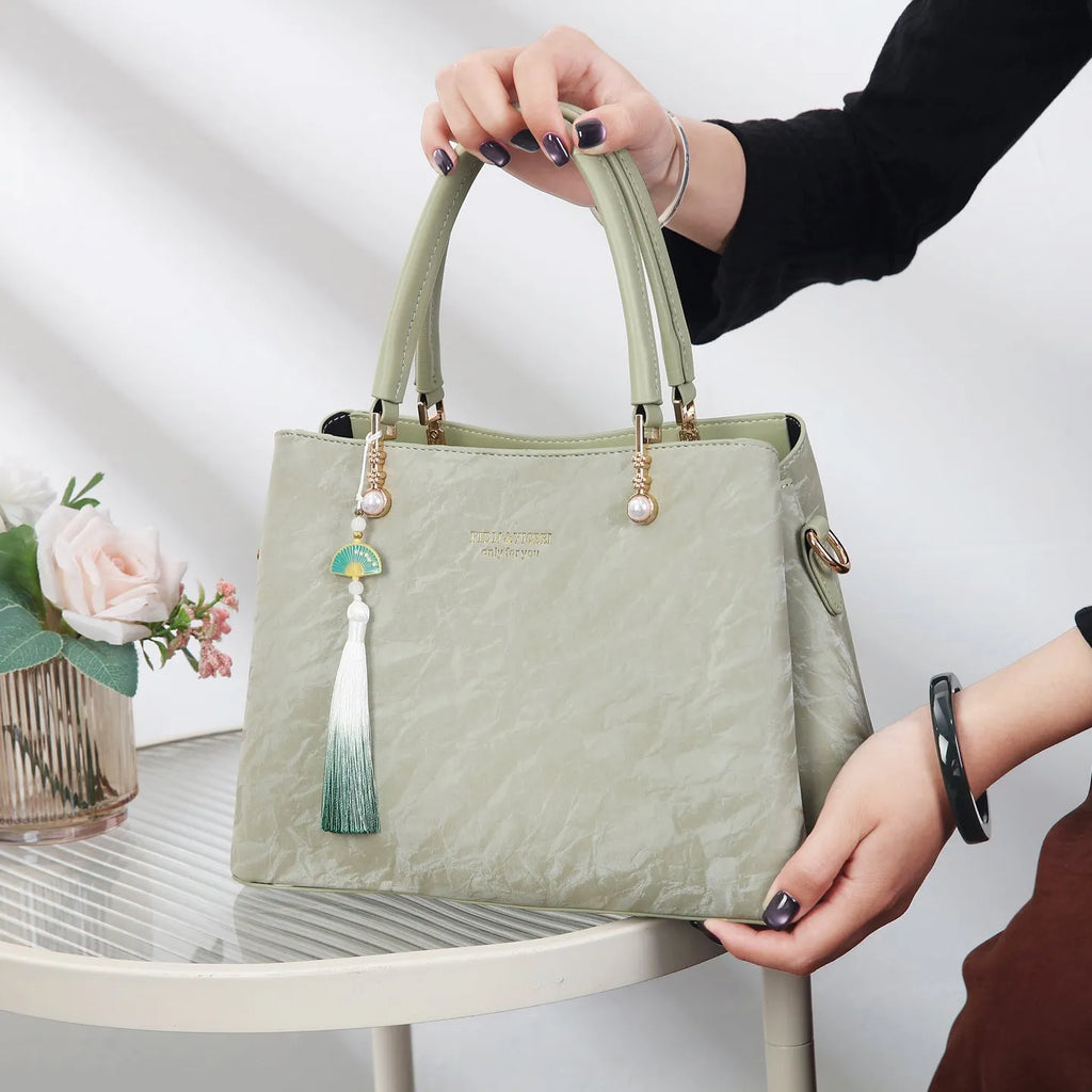 Women's PU leather shoulder bag with square shape and ethnic pattern in four colours