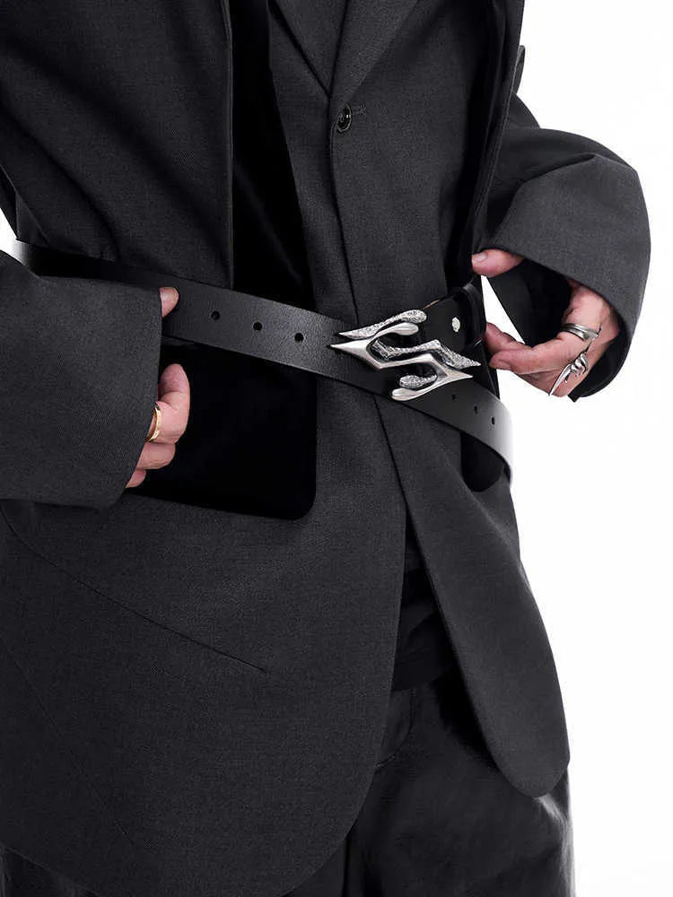 Black men's leather belt with a detailed metal letter buckle on a white background.