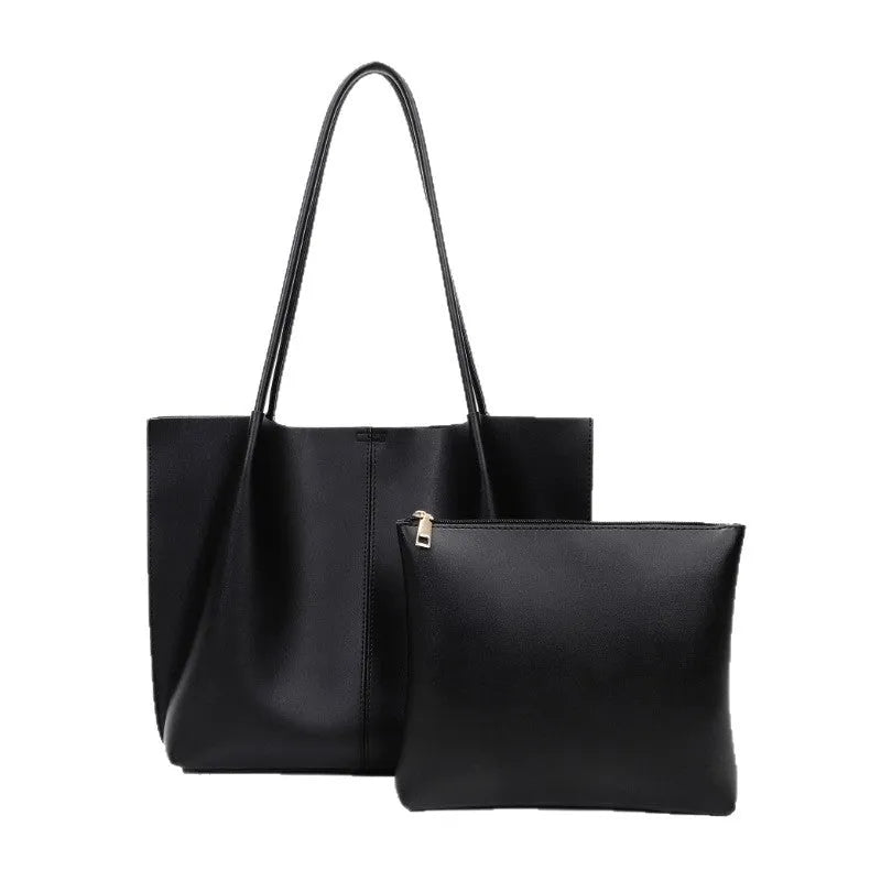 Women's large capacity soft PU shoulder bag in black with inner zip and outer sandwich pocket