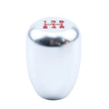 Universal aluminium alloy car gear shift knob with three rubber adaptor sleeves in sizes 8mm, 10mm, and 12mm.