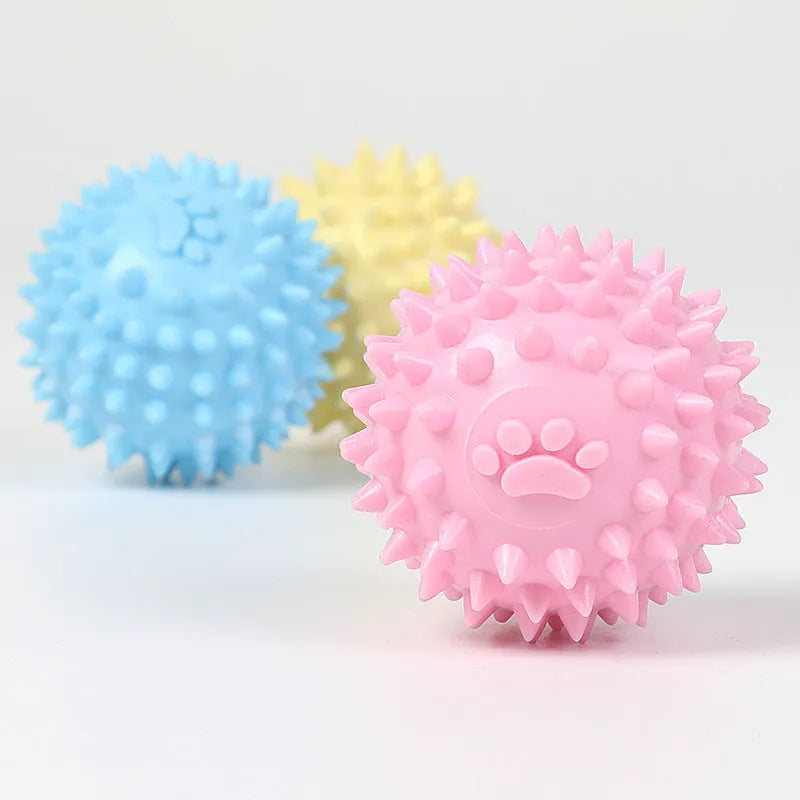 Blue TPR rubber pet chew ball with textured footprint design for teeth cleaning