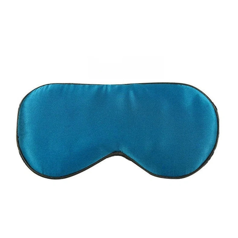 Silk eye mask with ice cube gel insert showing navy blue colour and adjustable strap