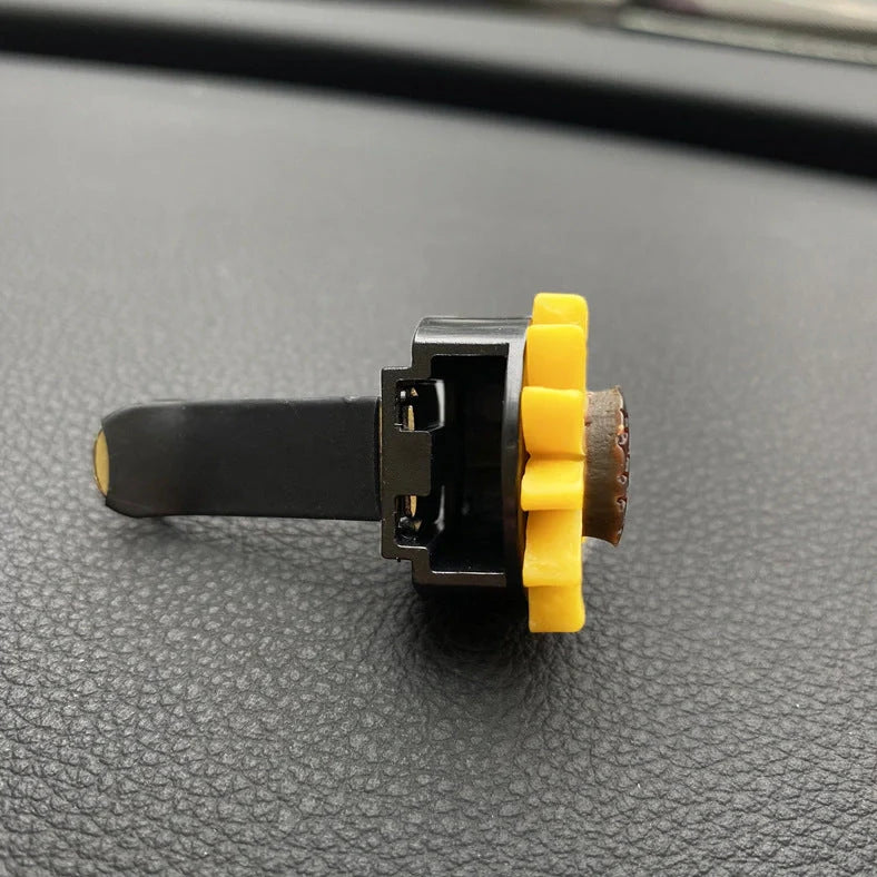Yellow sunflower car vent perfume clip measuring 8cm with secure mounting clip for air freshening