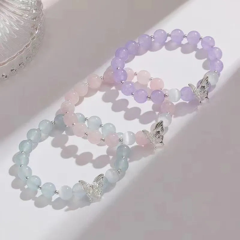 Women's crystal cat eye bracelet with butterfly charm and bow design in princess style
