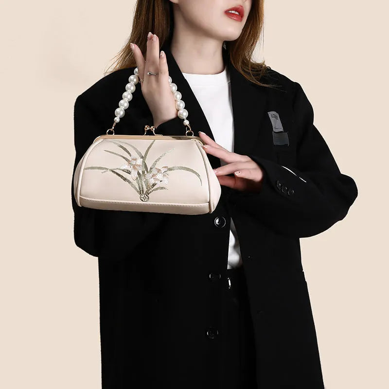 Beige soft PU leather women's shoulder bag with embroidery detail and shell shape design