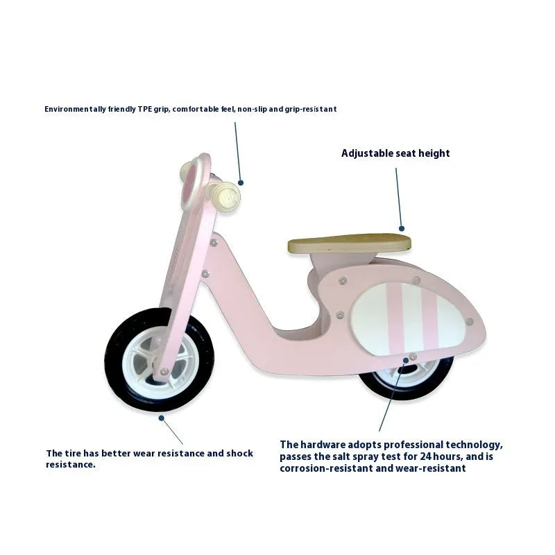 Pink wooden balance scooter for toddlers on a 10-inch wooden deck.