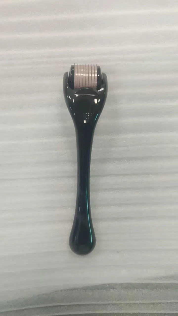 540 needle microneedle derma roller with colour wheel on black handle, showing 0.25mm specification.