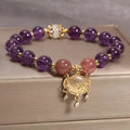 Handmade women's copper bracelet with natural amethyst crystal and gold longevity lock in retro style.