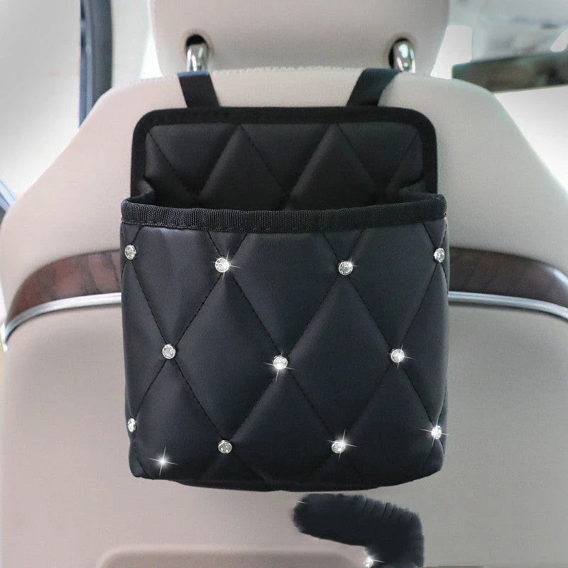 Premium PU leather car storage organiser with multiple compartments and built-in handbag holder for a tidy and organised driving experience.