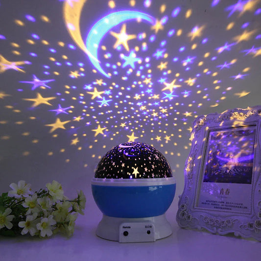 Starry Sky Projector Lamp casting a mesmerizing display of twinkling stars and swirling galaxies across a bedroom wall