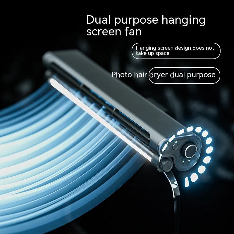 Black USB clip-on bladeless desk fan with integrated lamp attached to a computer monitor.