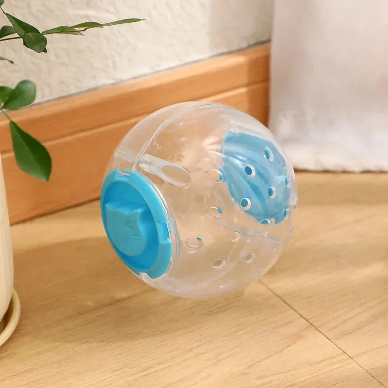 Blue slow feeding ball for cats with visible food compartment, 11.5cm diameter
