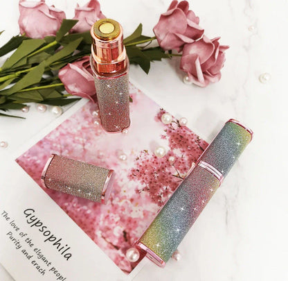 Lipstick-shaped electric eyebrow shaver with gold plated head