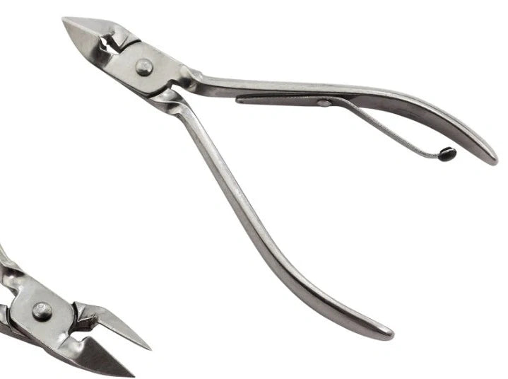 12-piece manicure kit with carbon steel tools including nail clippers and scissors in compact case