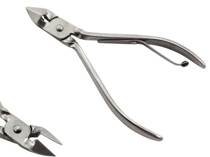 12-piece manicure kit with carbon steel tools including nail clippers and scissors in compact case