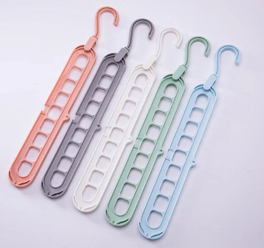 9-hole clothes hanger organizer in white, green, gray, and pink options