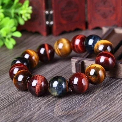 Premium natural tiger's eye crystal bracelet with Buddha beads, a captivating spiritual accessory for any style