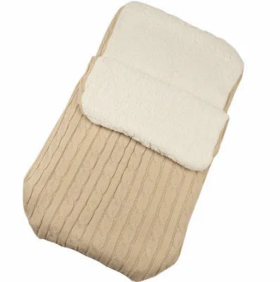 Envelope-style baby stroller sleeping bag in a choice of colours, shown with cotton wool filling and lamb cashmere lining.