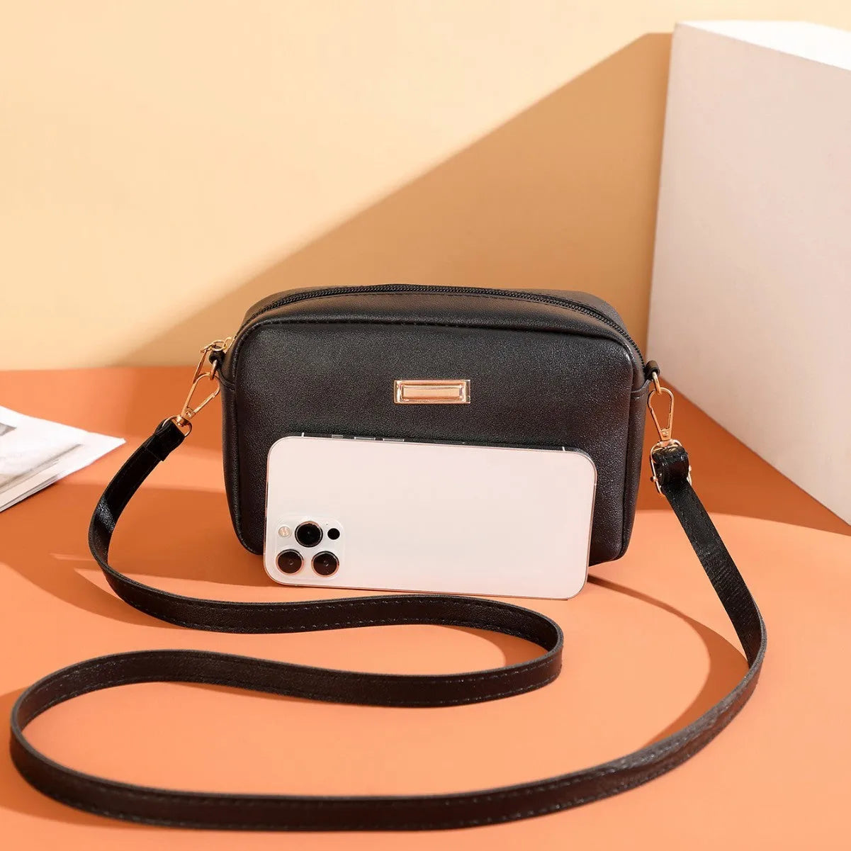 PU ladies' shoulder bag in solid colour with three-dimensional pocket and urban simplicity design