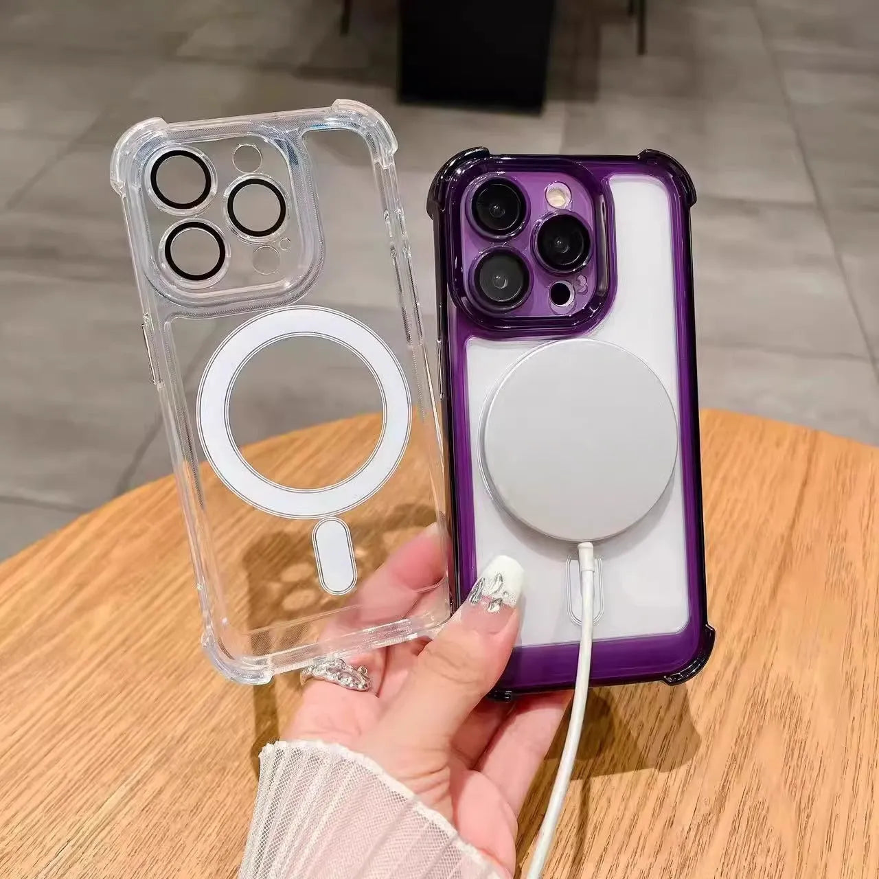 Transparent silicone airbag phone case with magnetic ring and raised camera lens protector for iPhone.