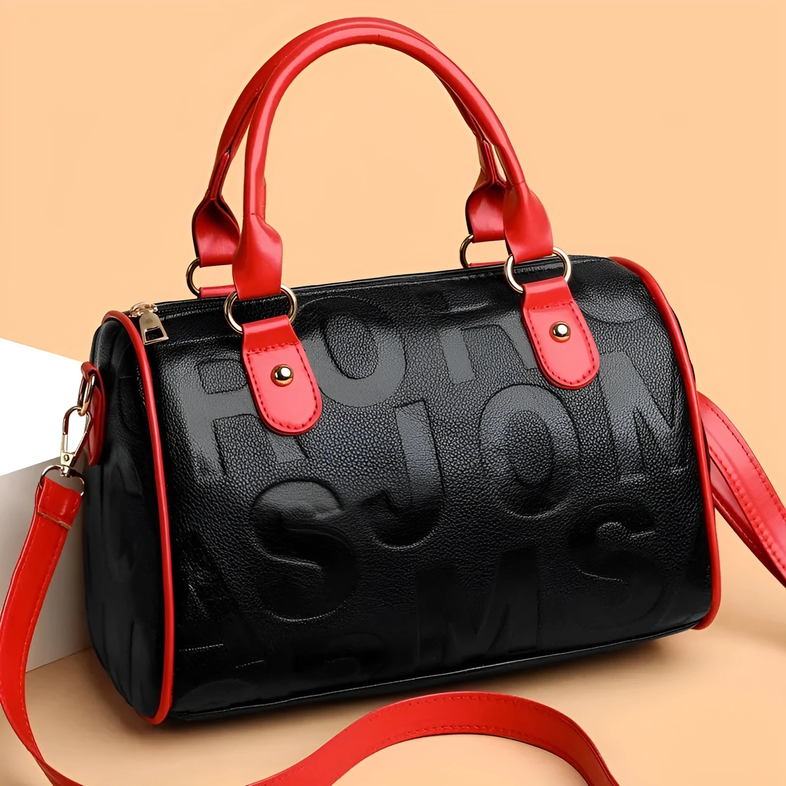 Cylindrical brown PU leather crossbody bag with three shoulder straps displayed