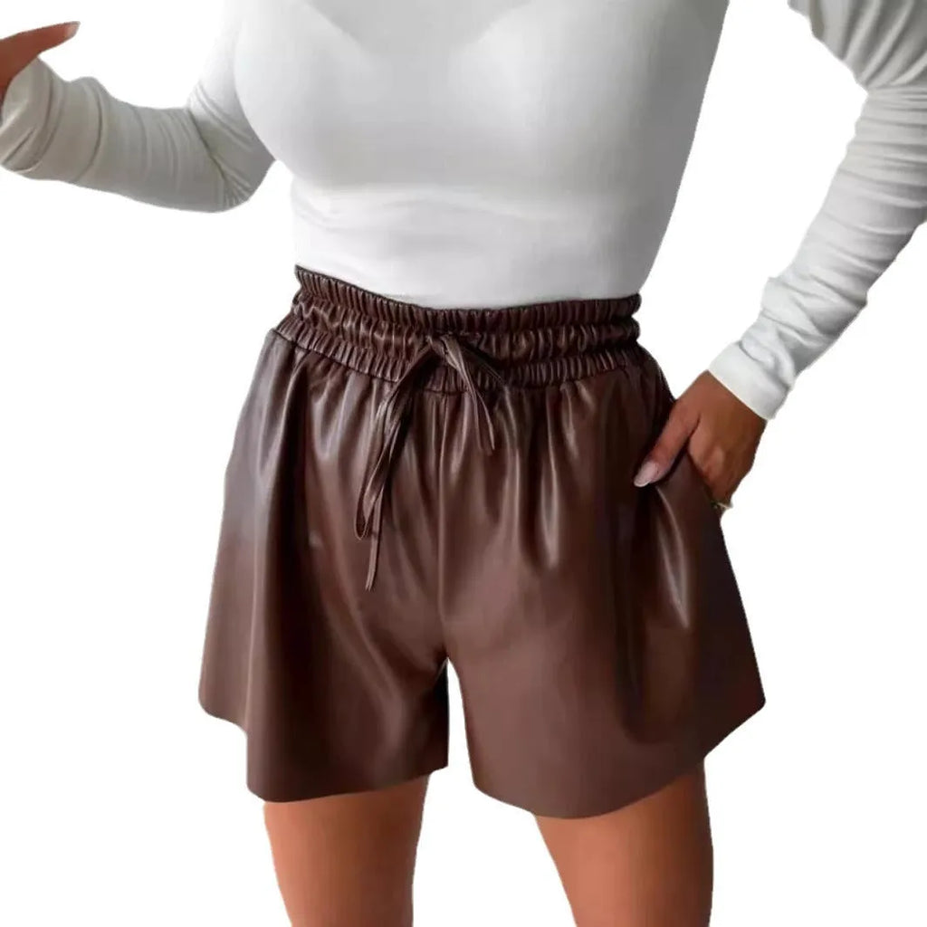 Women's black wide-leg casual shorts with a lace-up drawstring detail on the mid waist.