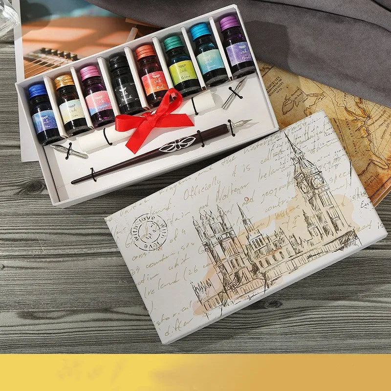 Wooden dip pen calligraphy gift set with coloured ink bottles in a storage box.