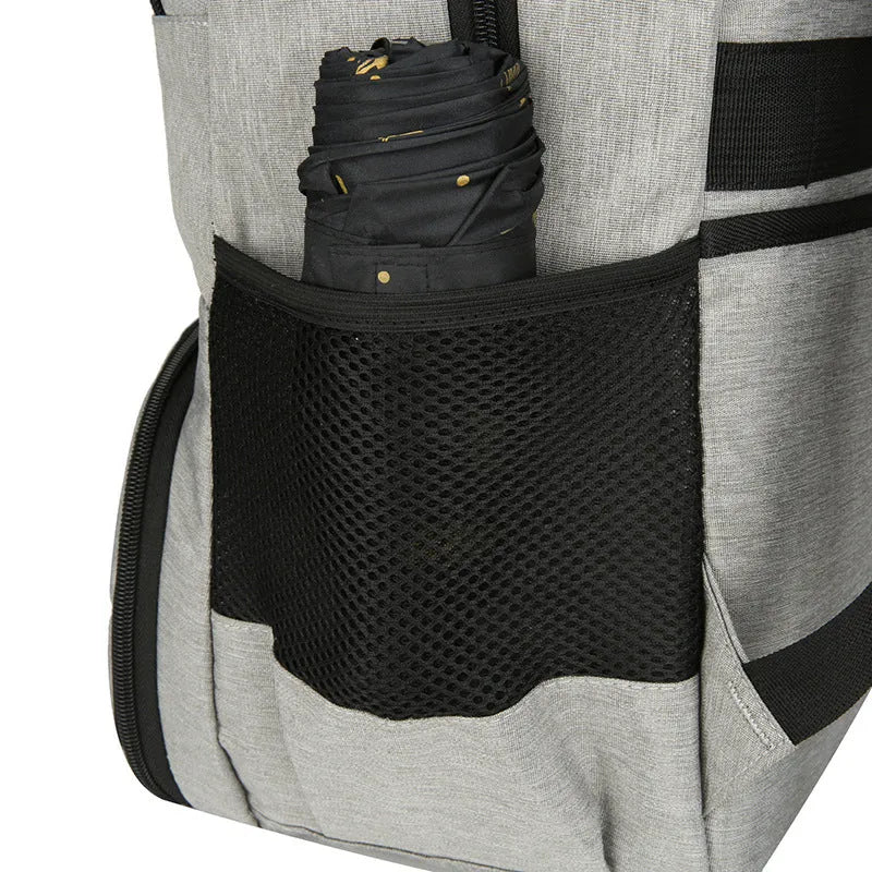 Light grey insulated Oxford cloth backpack with curved shoulder straps on a neutral background.