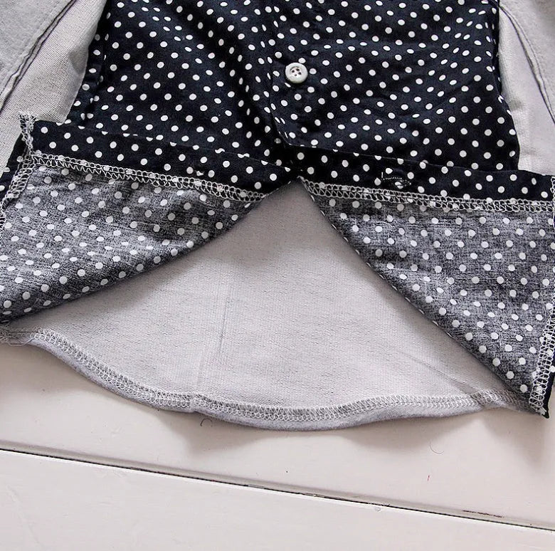 Blue children's casual sport suit tracksuit set with short sleeve top and elastic waist shorts on a hanger.