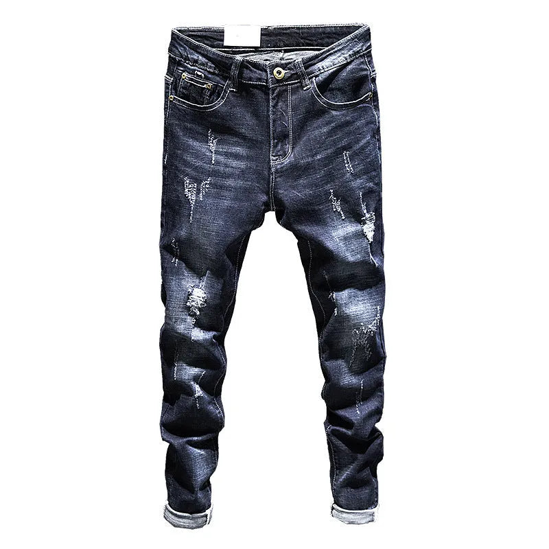 Men's slim-fit dark blue cotton denim jeans with a mid-waist and ankle-length leg.
