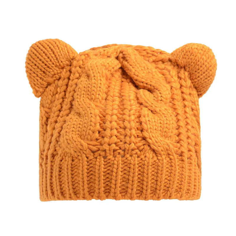 Hand made knitted cat ear beanie in wool showing 3D design and colour options