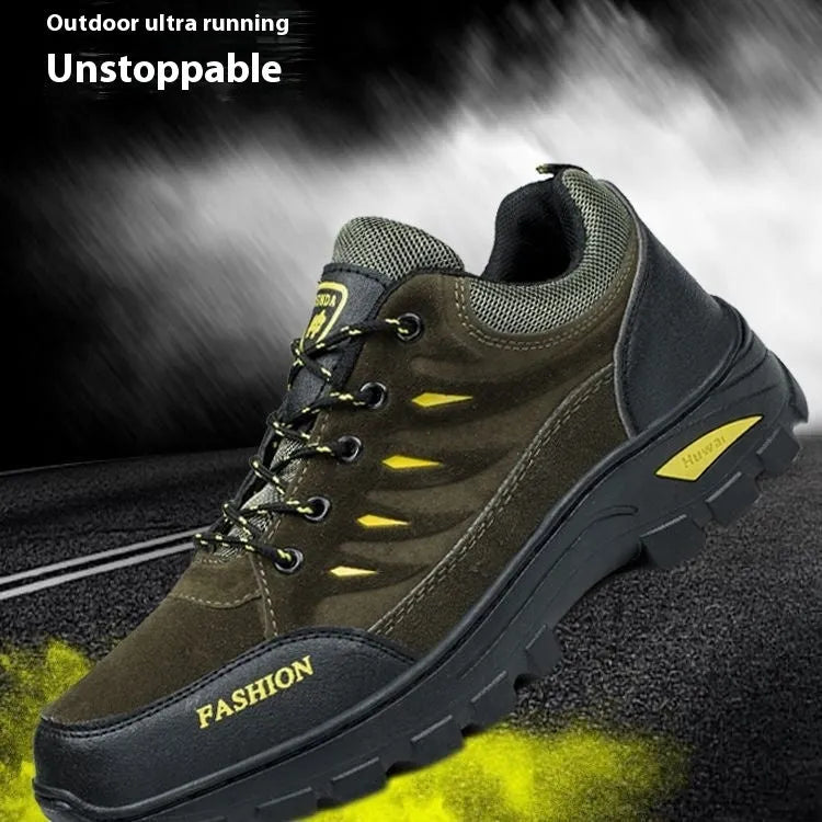 Men's brown suede hiking shoes with rubber sole and lace-up closure, showing round toe and mid-top design