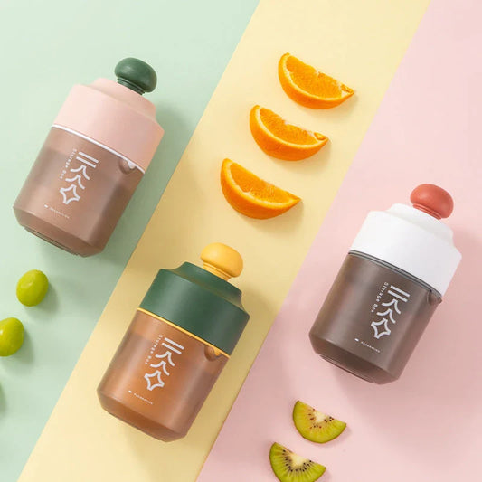 Compact manual citrus juicer with multiple color options and 400ml capacity for effortless, portable juicing