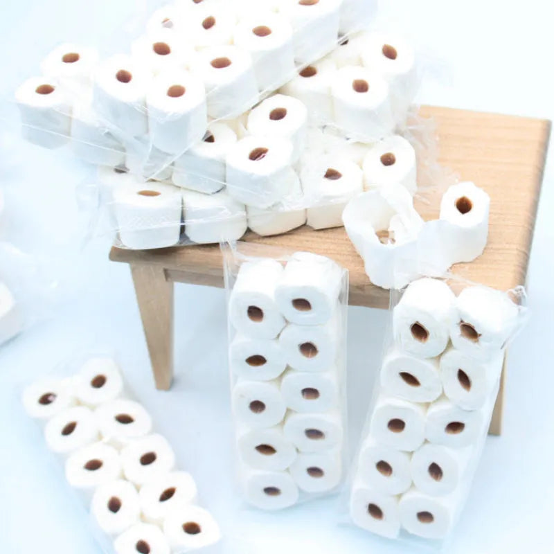 Small white paper model of a tissue roll for dollhouse play, showing 30mm width and 80mm height.