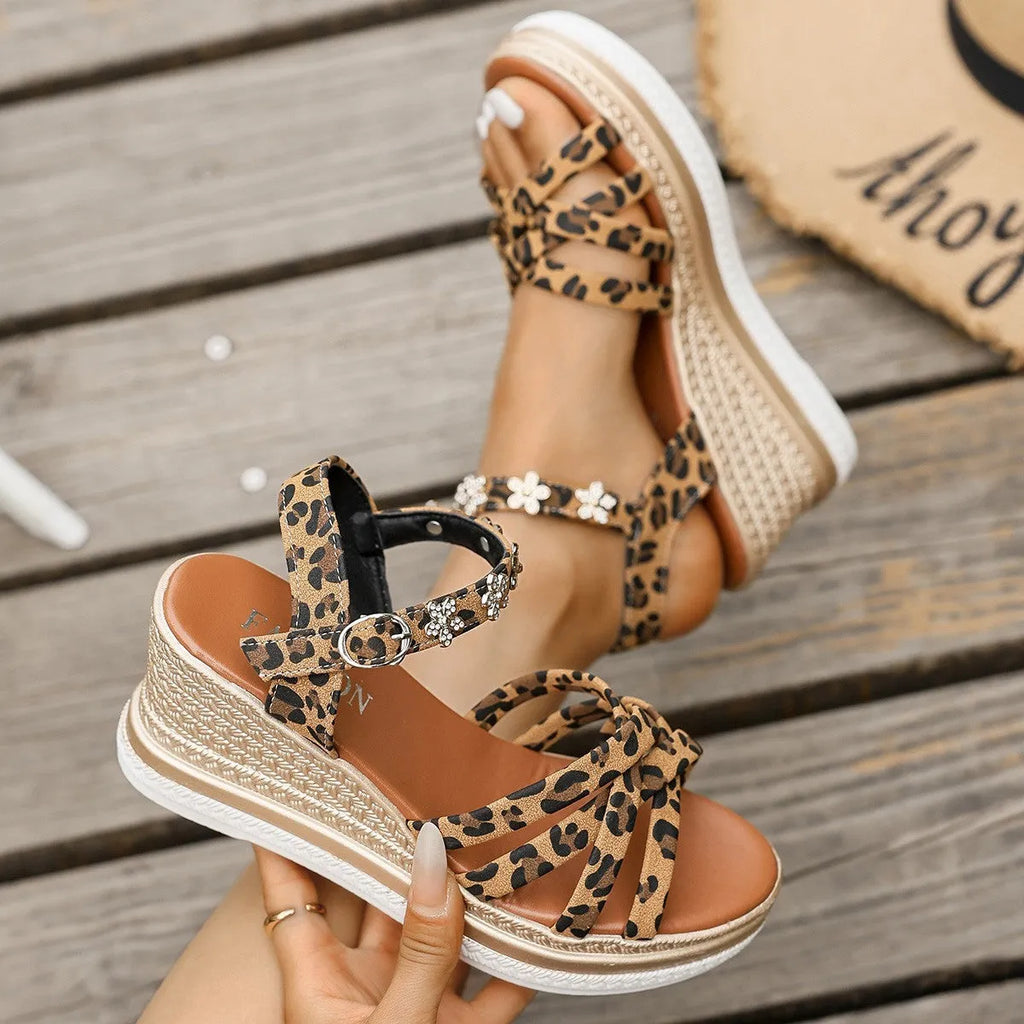 Light brown suede platform sandals with adjustable ankle buckle and open toe design