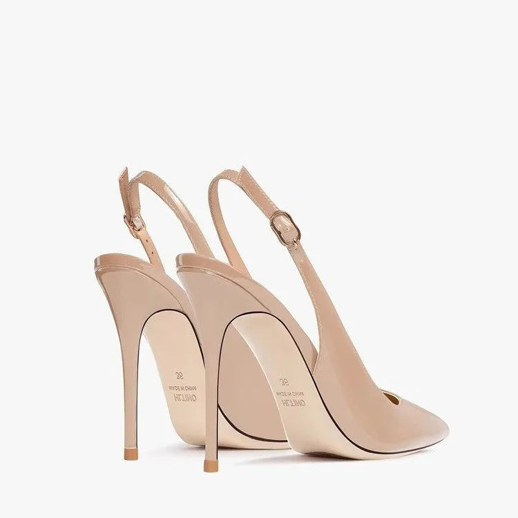 Women's nude high-heeled sandals with an ankle strap and hollow-out design on a soft PU upper.