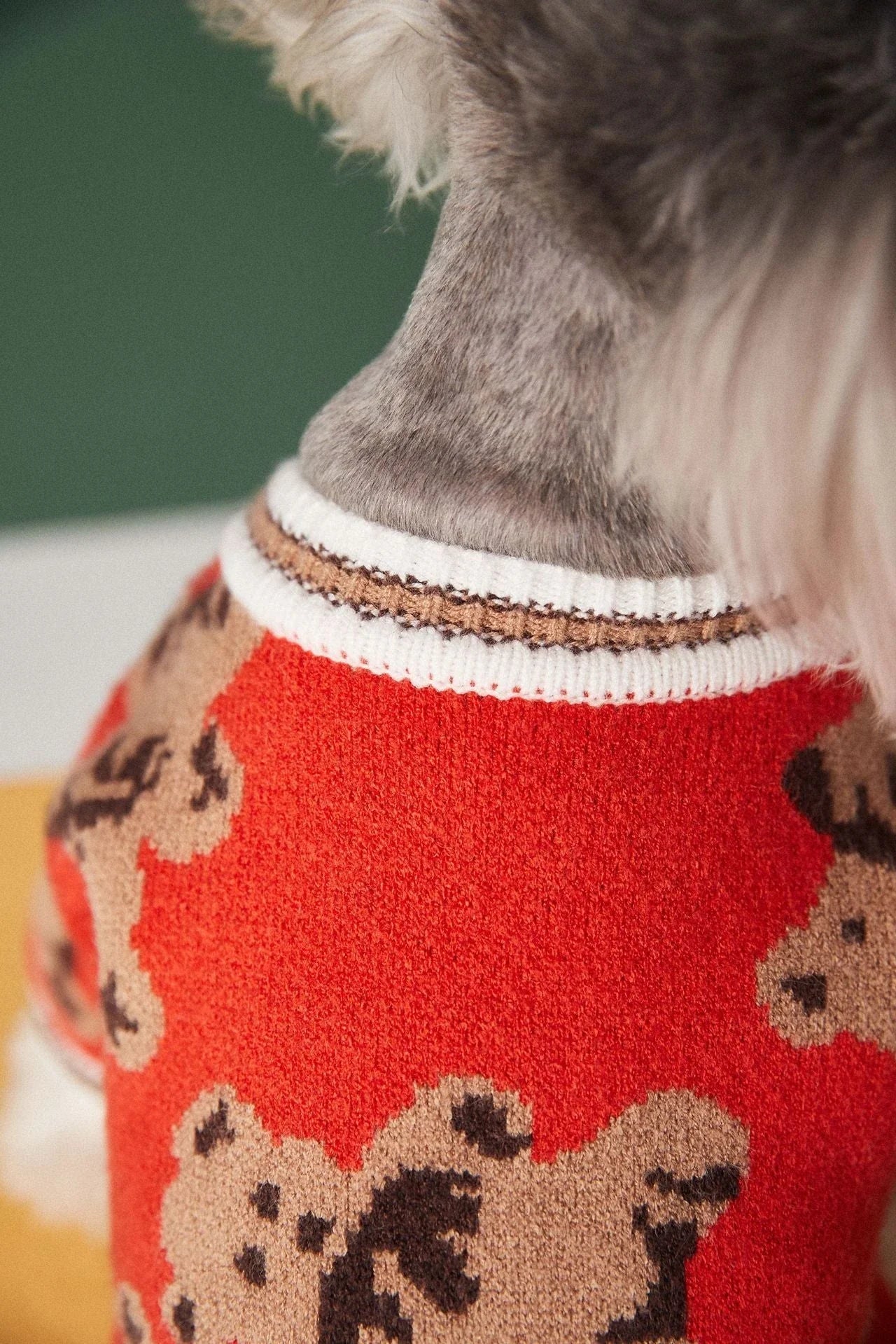 A stylish striped pet sweater made of premium New Zealand wool for cosy winter comfort